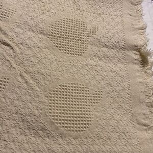 New in package cream color throw